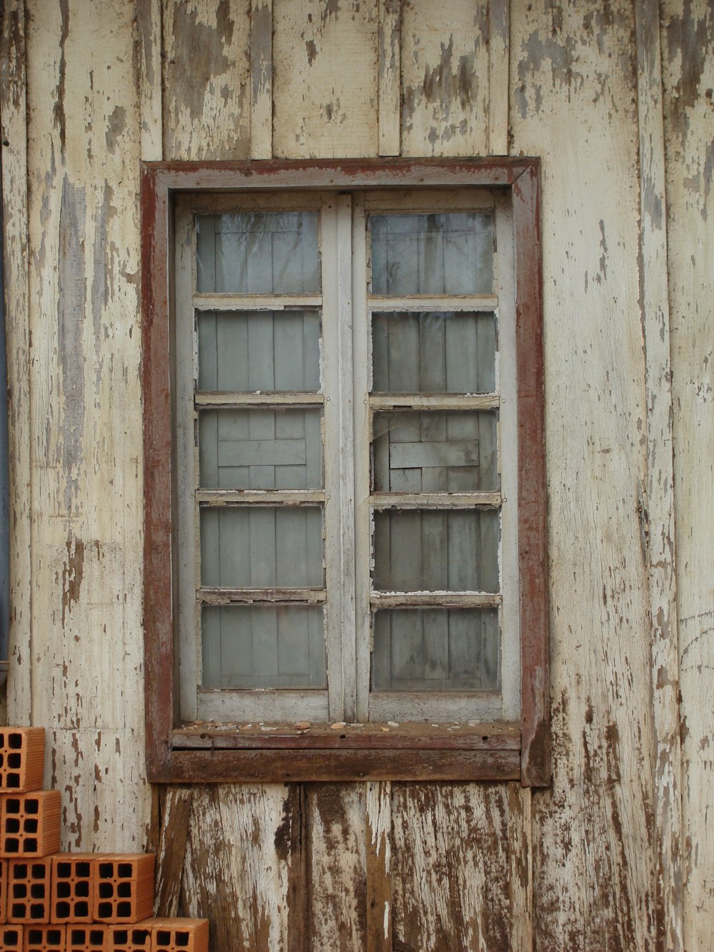 brown wooden framed glass window