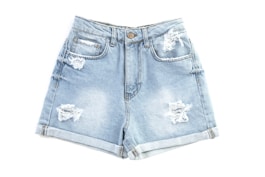 blue denim shorts on white surface