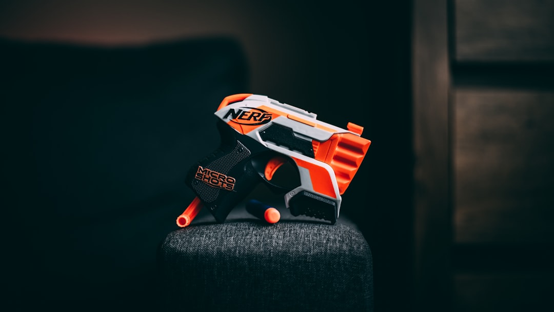 orange and white nerf gun