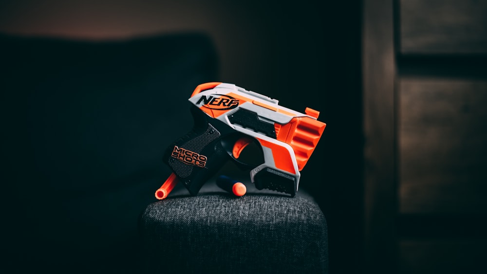 orange and white nerf gun