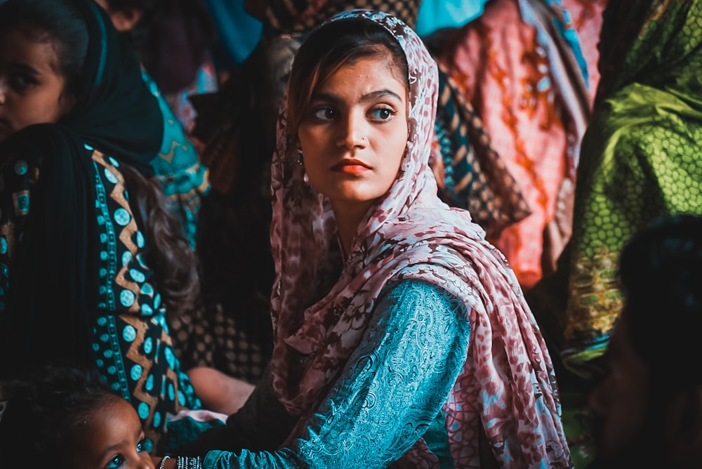 woman in green and brown hijab