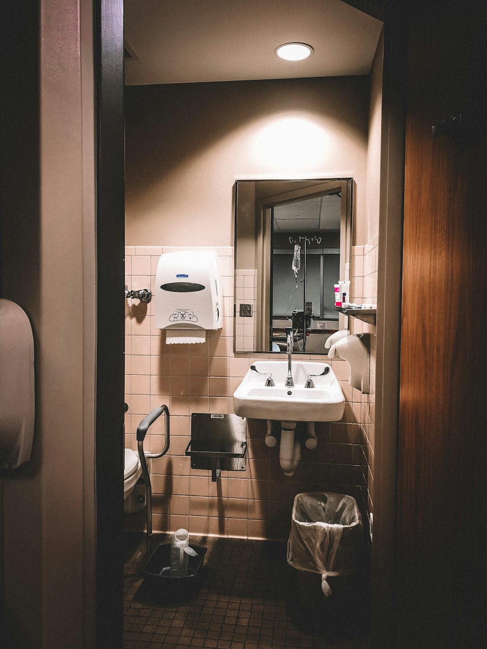 white ceramic sink with faucet