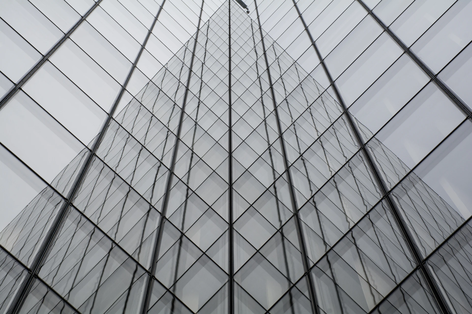low angle photography of glass building