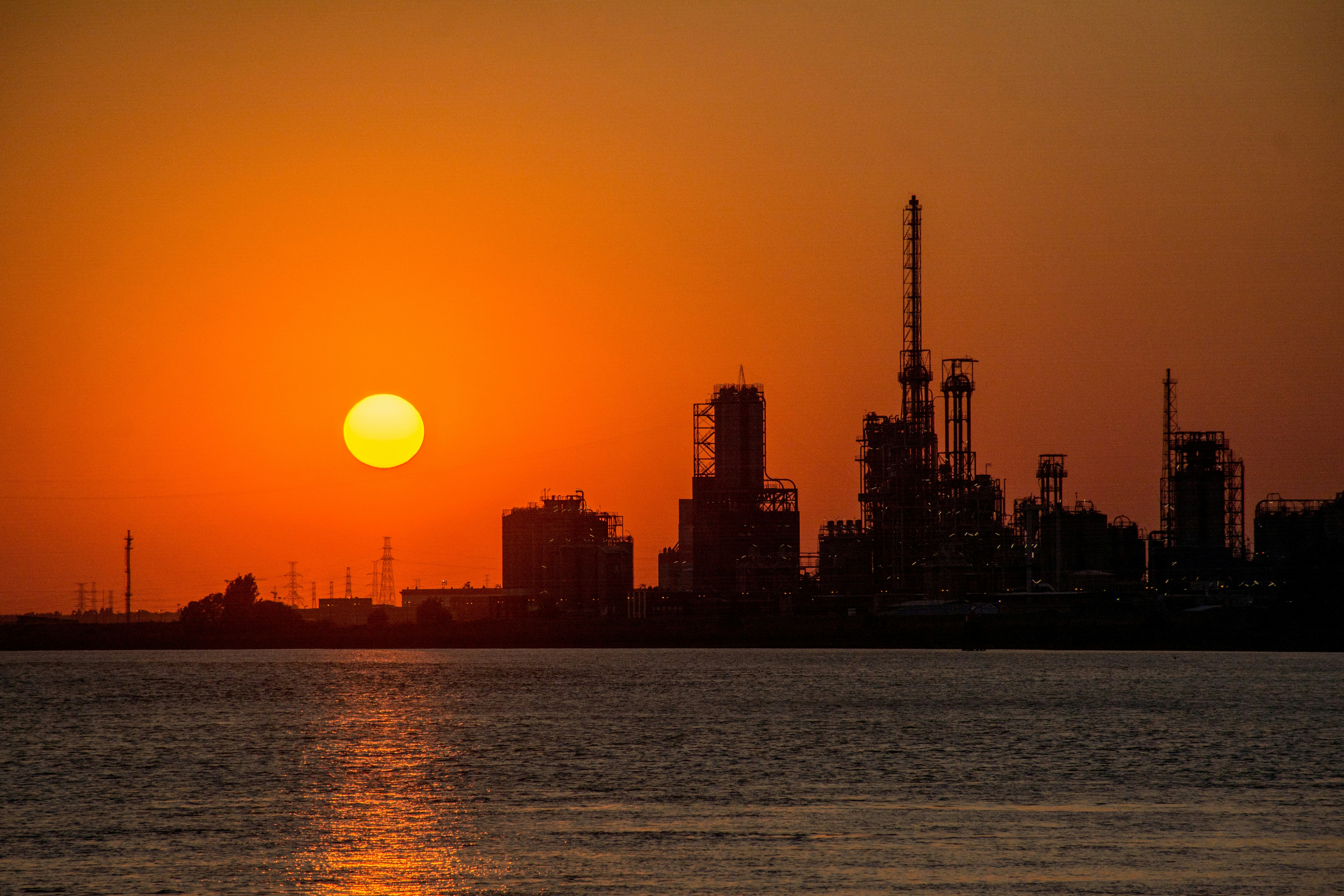 silhouette of city buildings during sunset