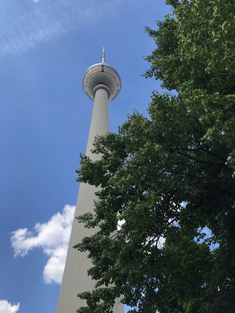 white concrete tower under blue sky during daytime