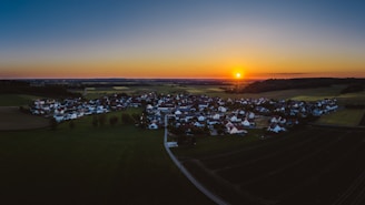 A picturesque view of the eco-village at sunset.