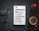 A book titled 'The Communication Book: 44 Ideas for Better Conversations Every Day' is placed on a dark textured surface. Next to it are a pair of glasses, an apple, and a cup of coffee.