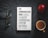 A book titled 'The Communication Book: 44 Ideas for Better Conversations Every Day' is placed on a dark textured surface. Next to it are a pair of glasses, an apple, and a cup of coffee.