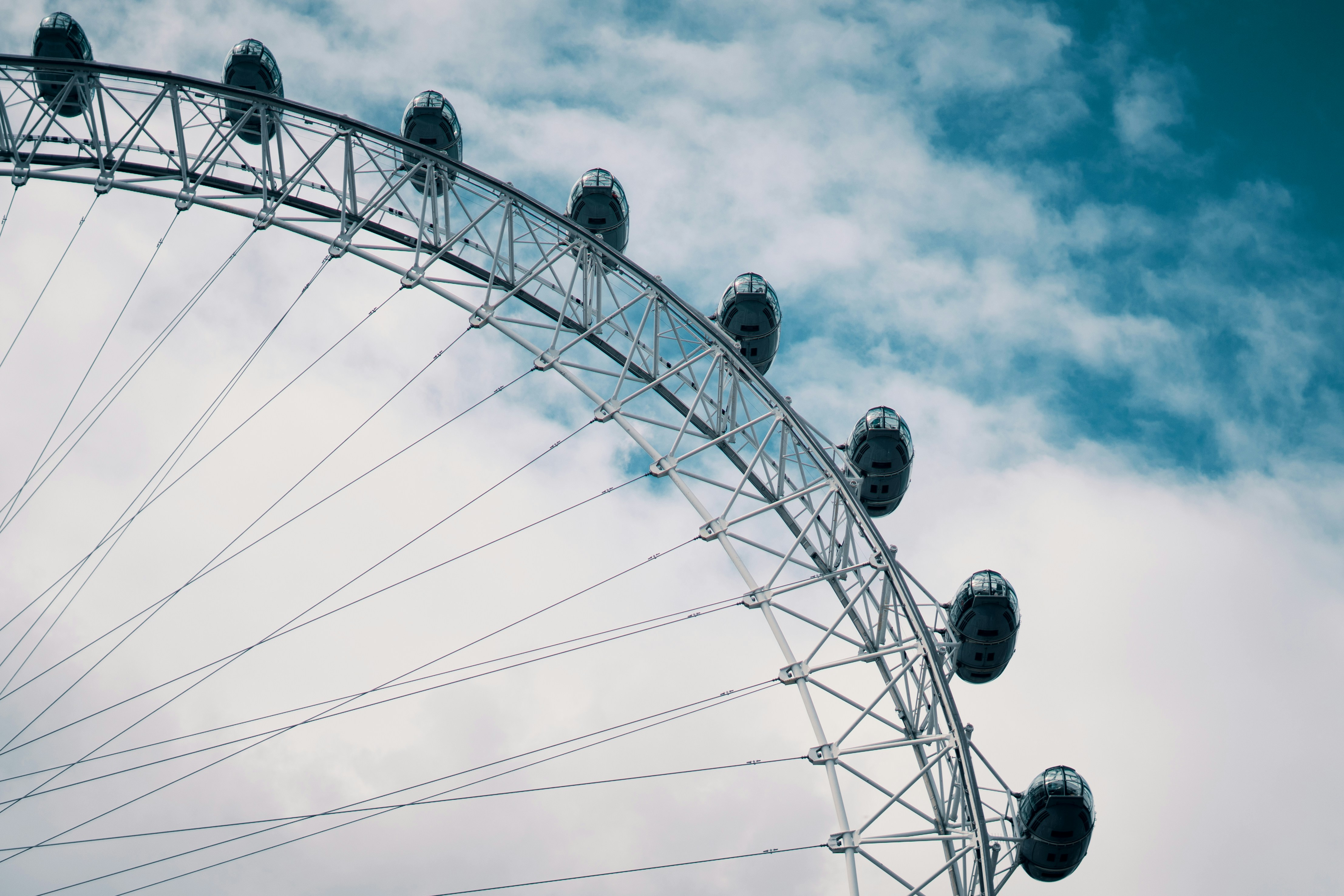 white ferris wheel under blue sky during daytime