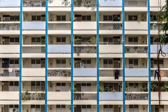 blue and white concrete building during daytime