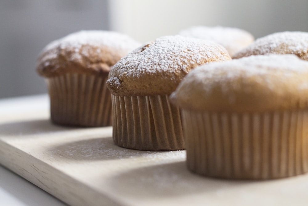 brown cupcake on white table