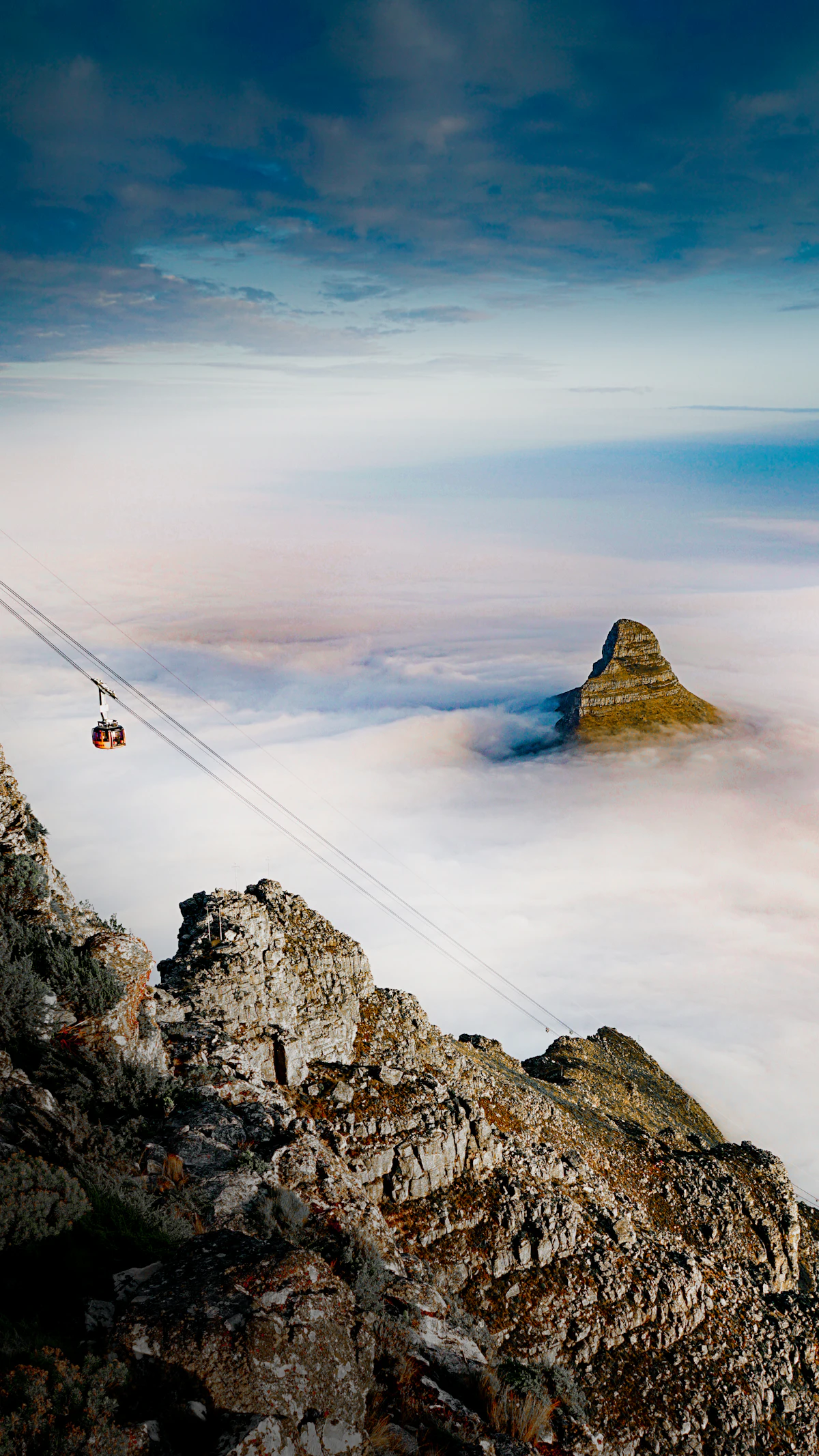 Cable car above Cape Town with Lion's Head in view