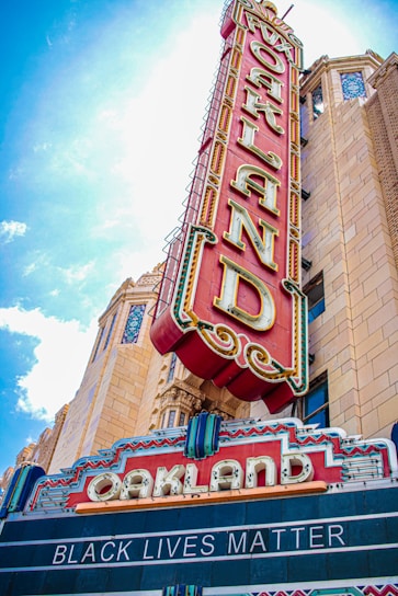 brown and red concrete building under blue sky during daytime