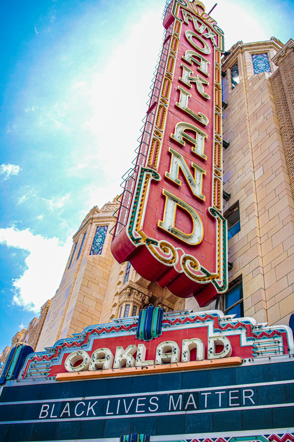 brown and red concrete building under blue sky during daytime