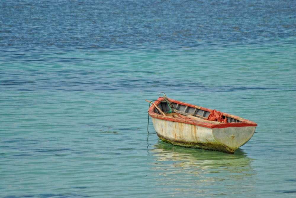 brown boat on body of water during daytime