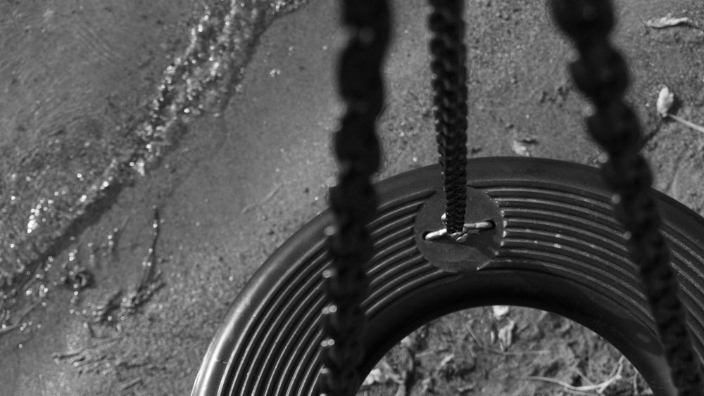 grayscale photo of metal chain