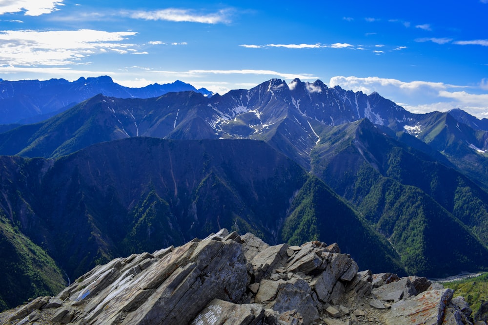 green and brown mountains under blue sky during daytime