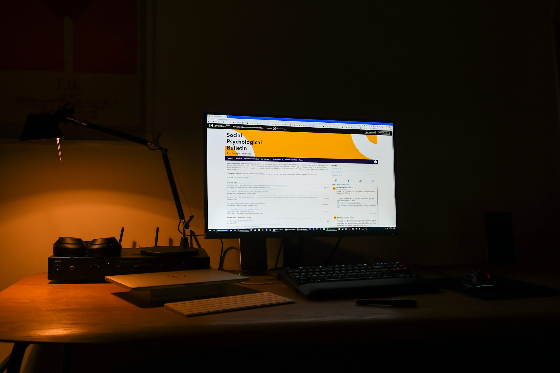 black flat screen computer monitor turned on beside black computer keyboard