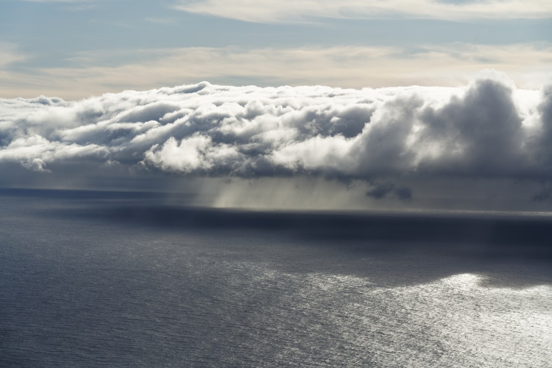 white clouds over the sea