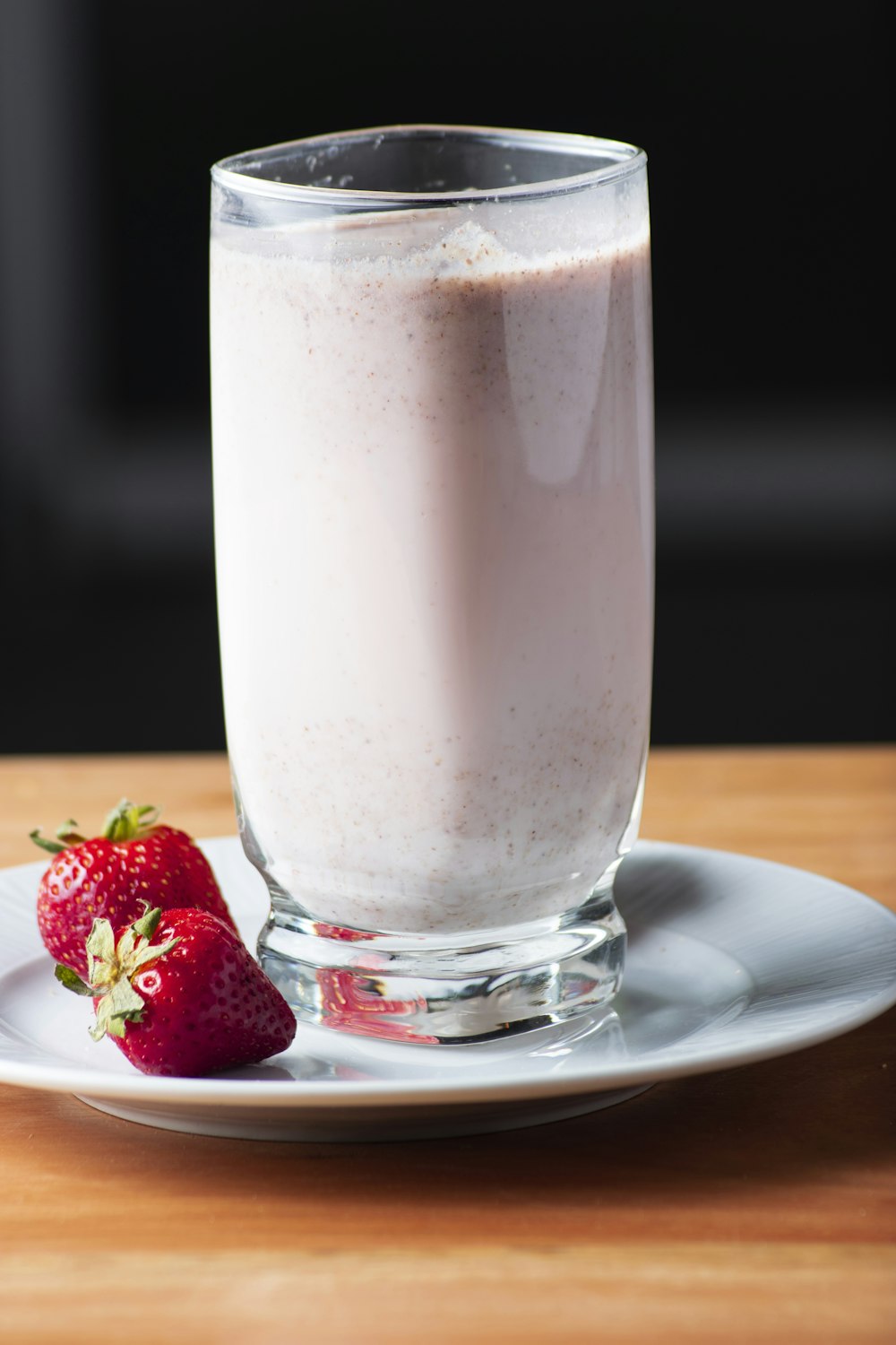 clear drinking glass with strawberry juice