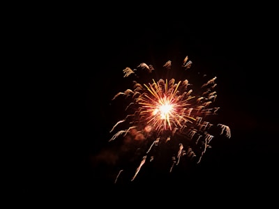Close-up of sparkling fireworks bursting in vibrant colors.