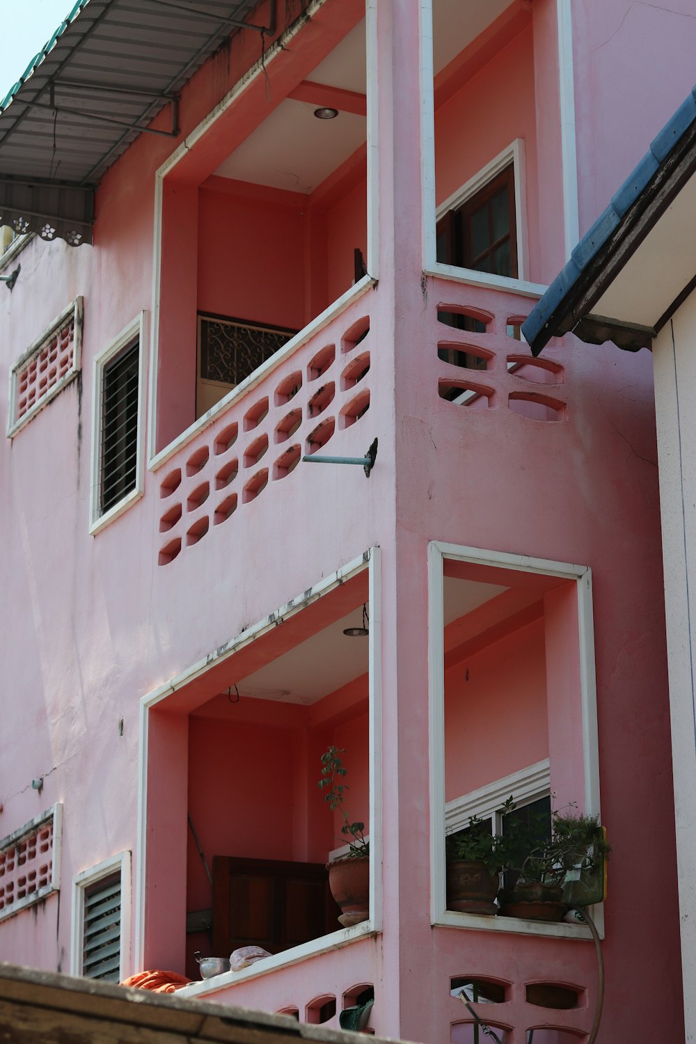 pink and white concrete building