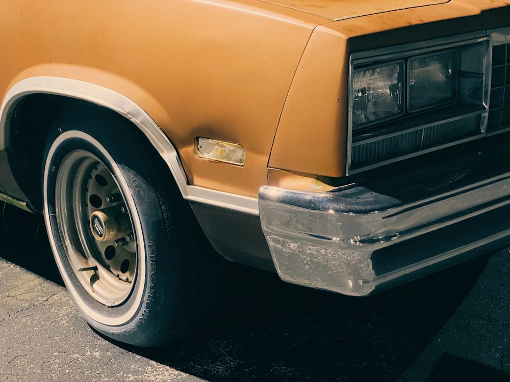 yellow car with gray wheel