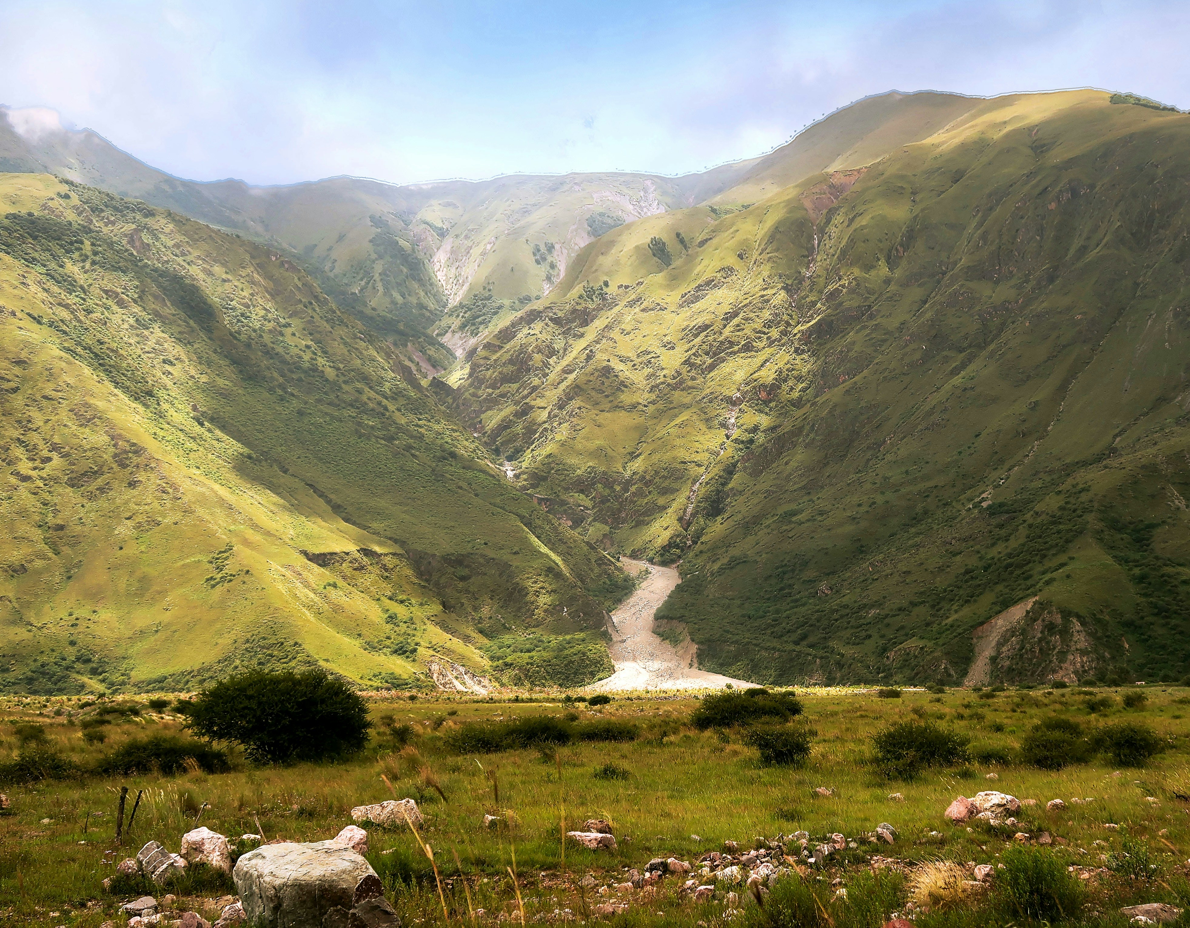green mountains under white sky during daytime