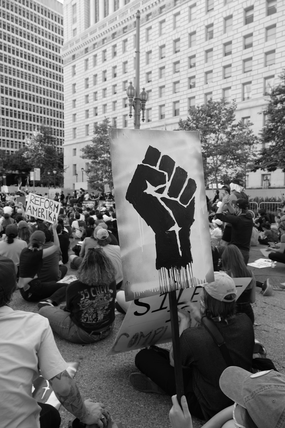 grayscale photo of people walking on street