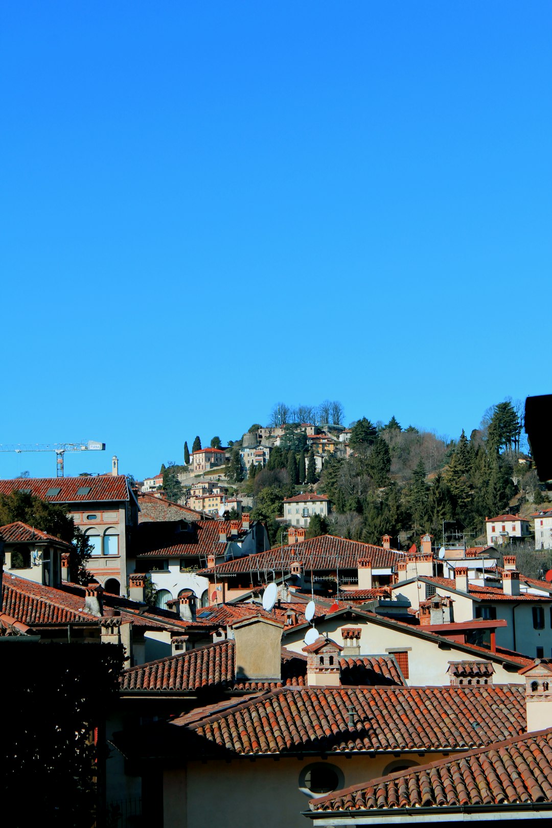 brown and white concrete houses under blue sky during daytime