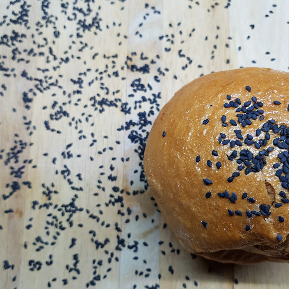 brown bread on white and blue floral textile