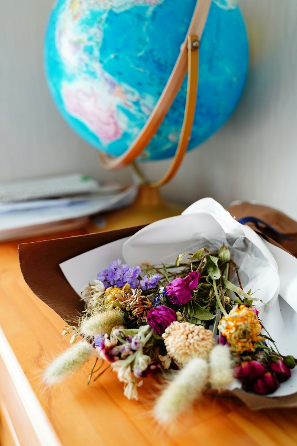 bouquet of flowers on brown wooden table