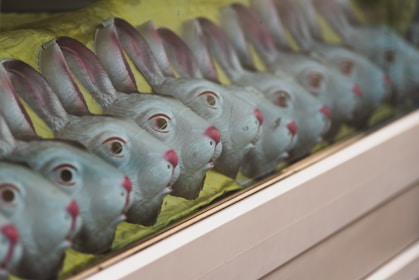 gray fish figurine on white shelf