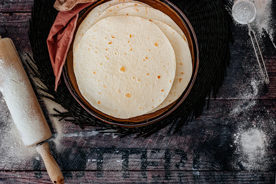 A vibrant platter of fresh tropical Latin seafood and tortillas