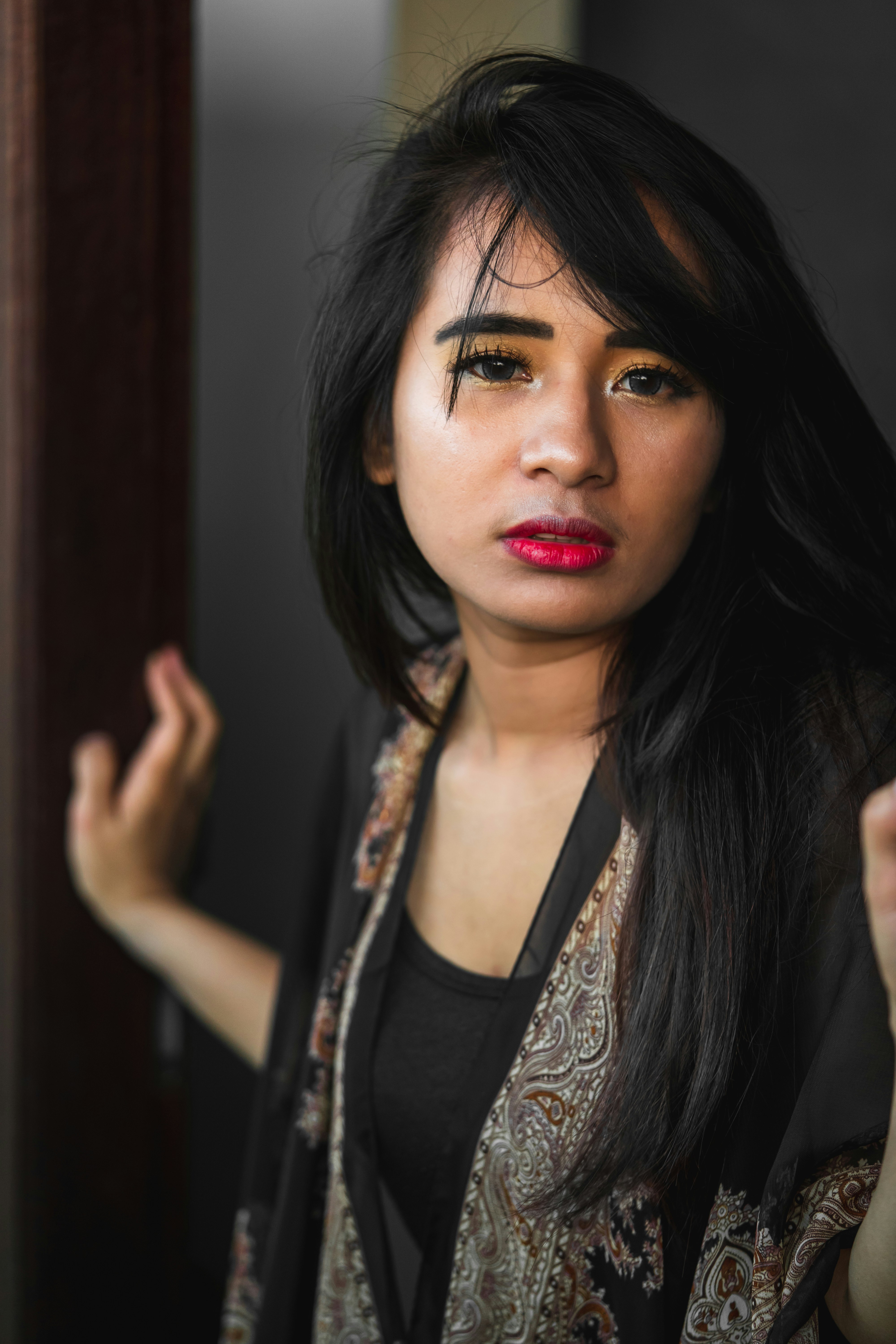 Woman in black and white floral sleeveless top photo Free Indonesia