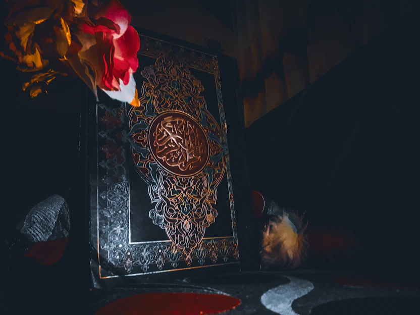 A joyful child coloring a vibrant storybook page with Islamic motifs