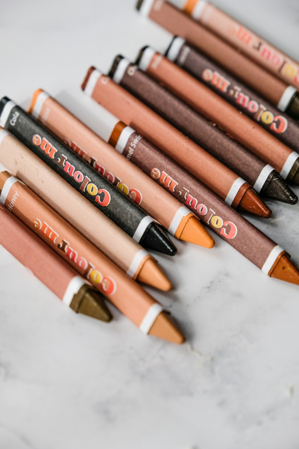 orange and black coloring pencils