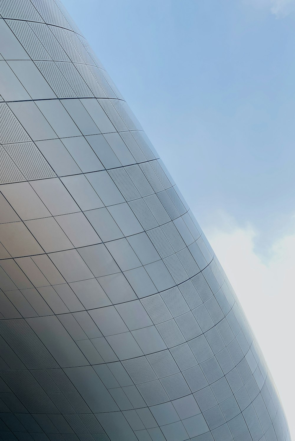 white concrete building under blue sky during daytime