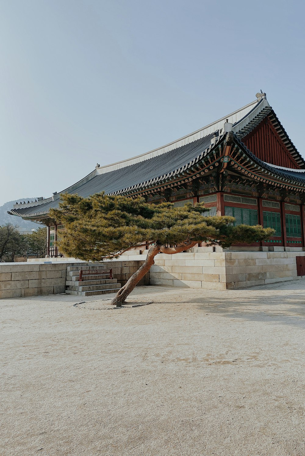 white and brown temple under blue sky during daytime