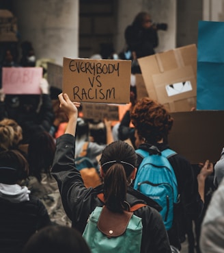 people holding brown wooden board