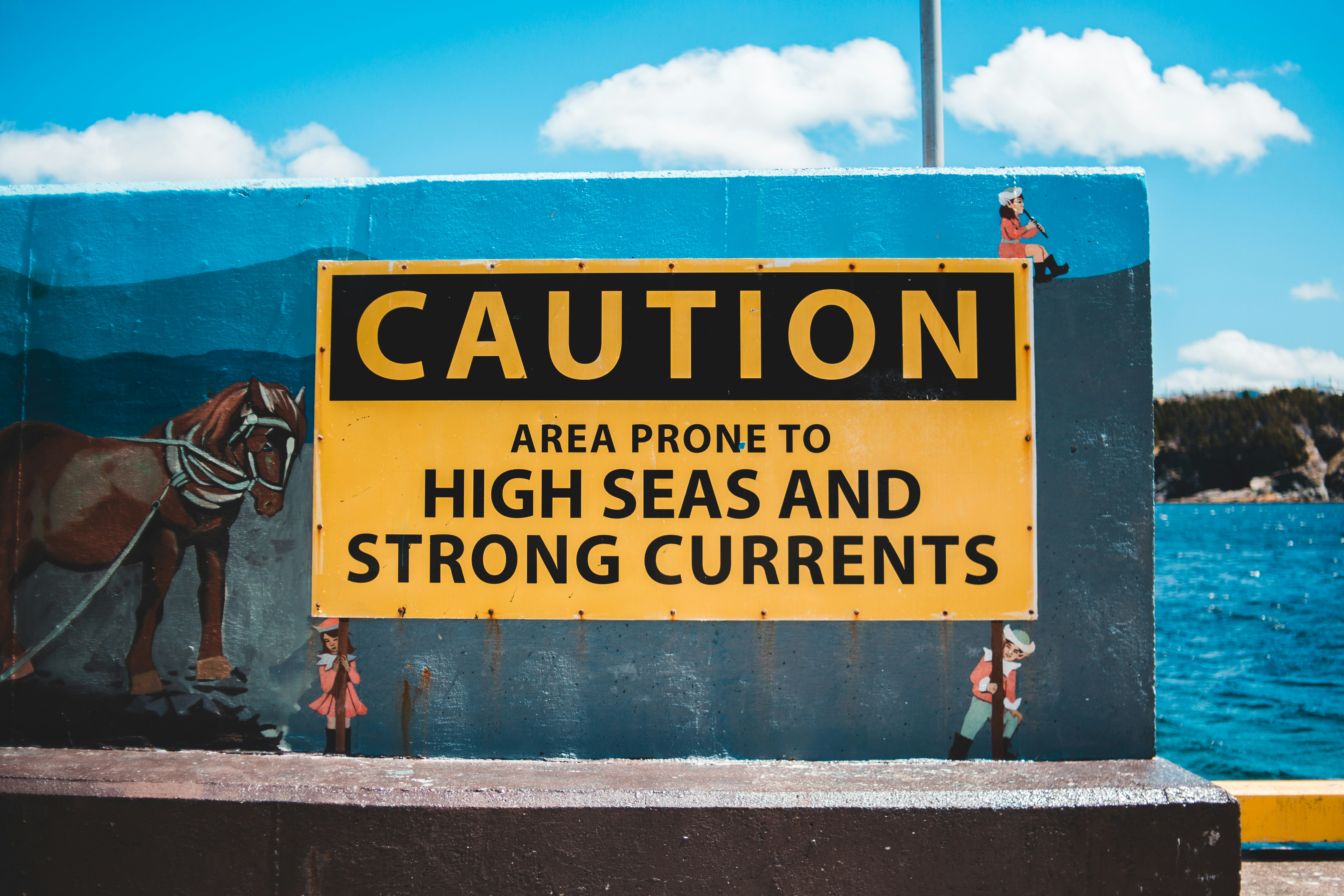 yellow and black no smoking signage