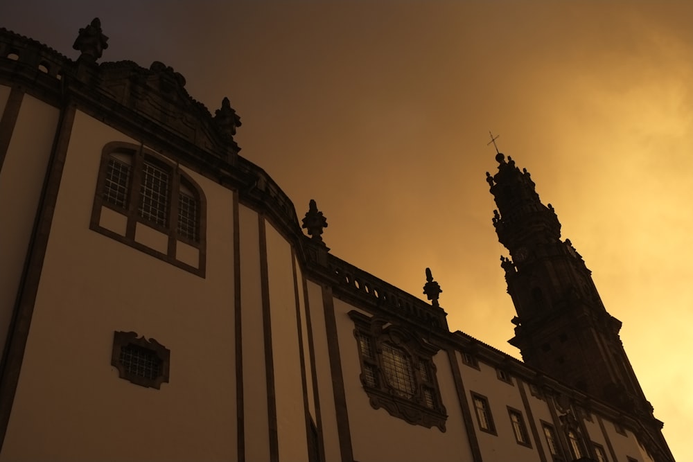 silhouette of building during sunset