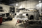 white vintage car in garage