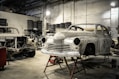 white vintage car in garage