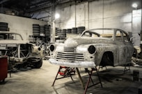 white vintage car in garage