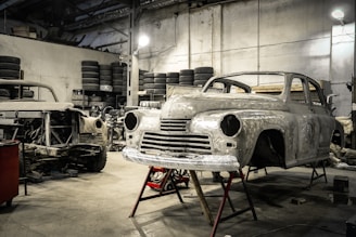 white vintage car in garage