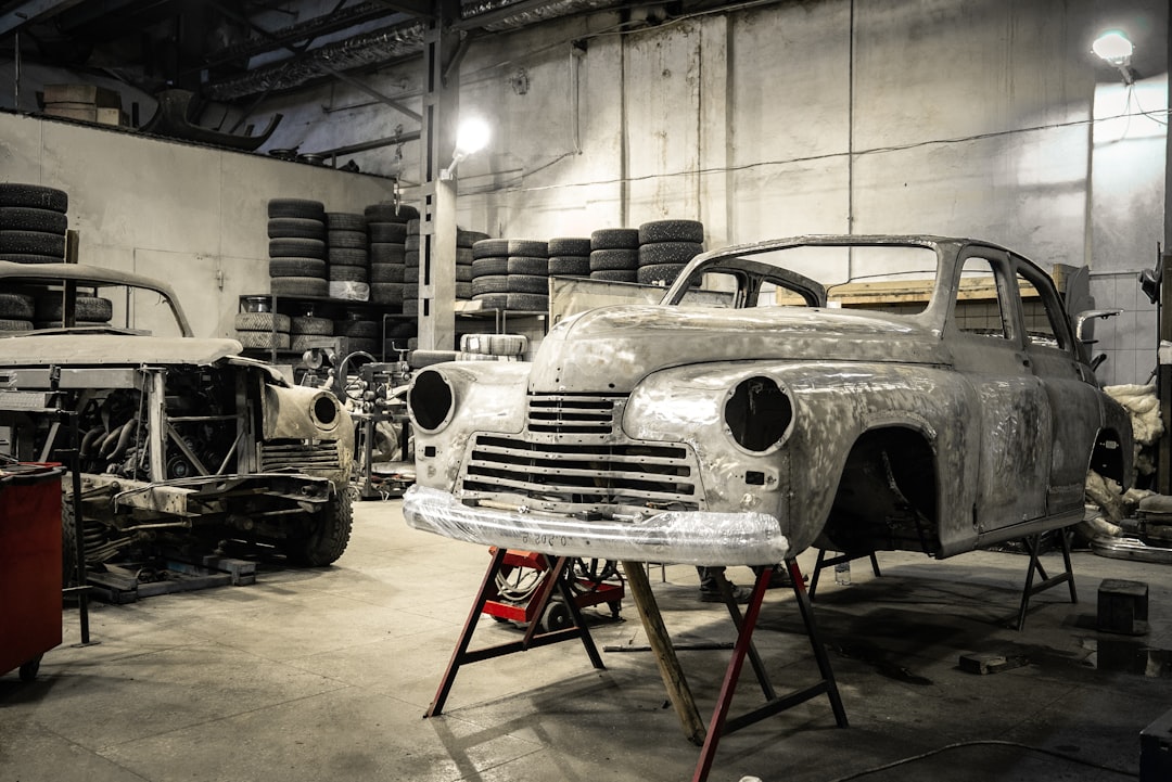 Old cars in restoration workshop
