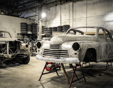 white vintage car in garage