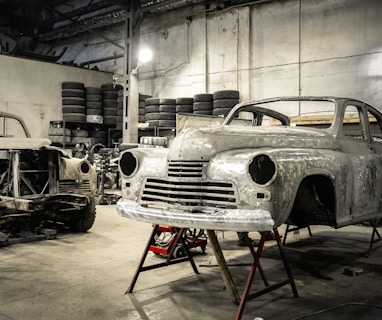 white vintage car in garage