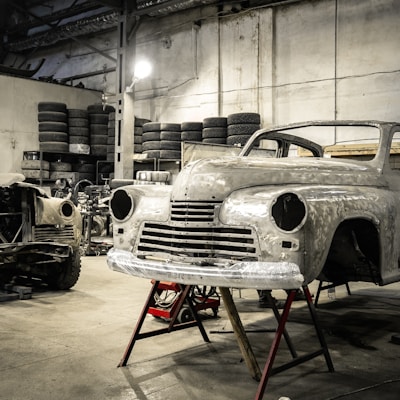 white vintage car in garage